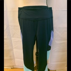 FILA Capri leggings. Navy blue with color on the sideSize L NWOT